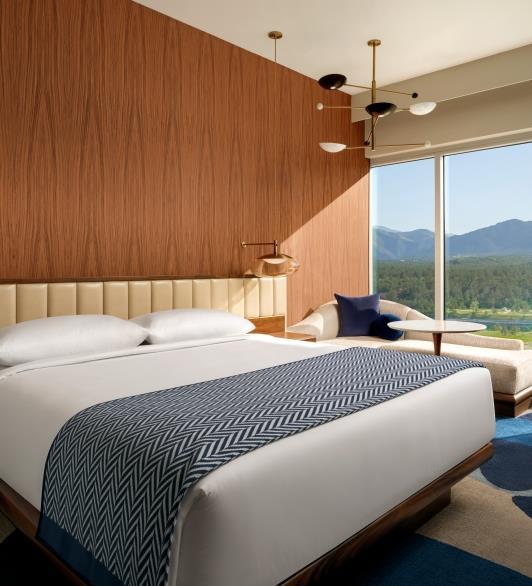 White bed in a room with a view