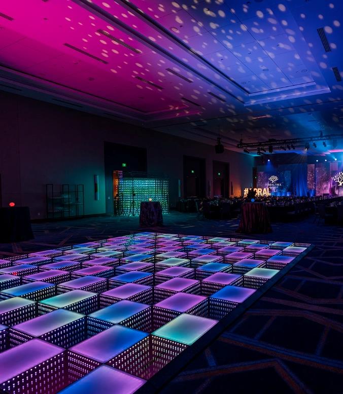 A dance floor lit up with lights