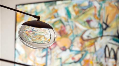 An art piece with glass in front of it
