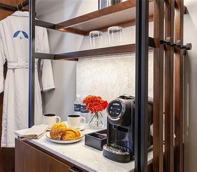 Robes and amenities in hotel room 